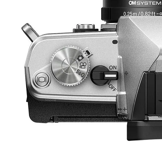 OM-3 top plate showing dedicated video mode dial